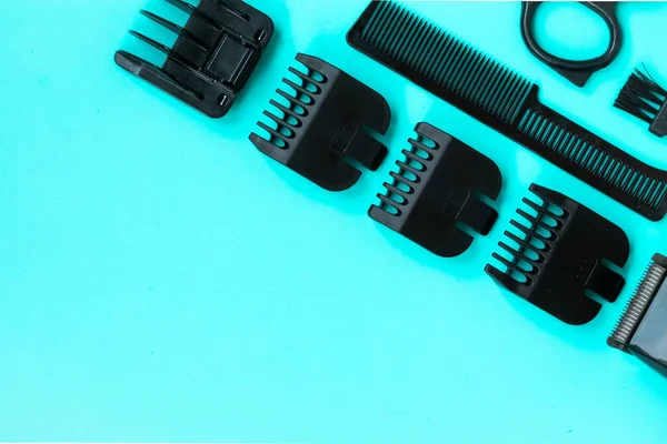 Beard clipper on a turquoise background. Beard trimmer. Barber tools template. Barber. Beard care.