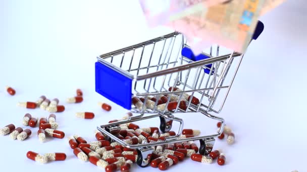 Pequeño carrito de compras con pastillas — Vídeos de Stock