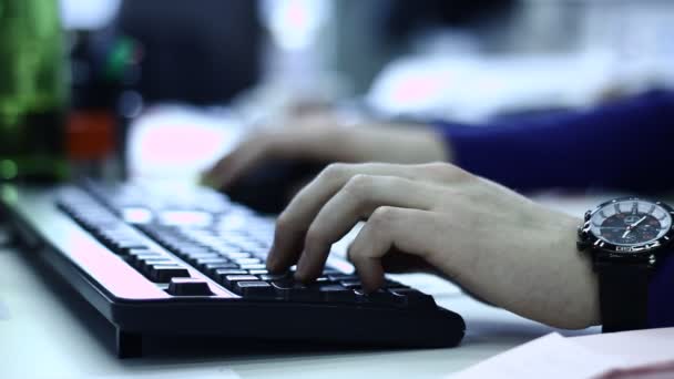 Person typing on keyboard — Stock Video