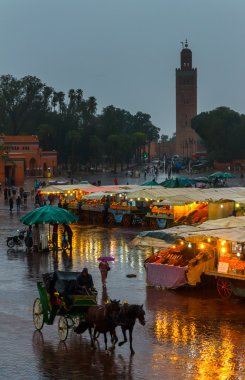 Heavy rain in the evening. Morocco, Djemaa el Fna  clipart