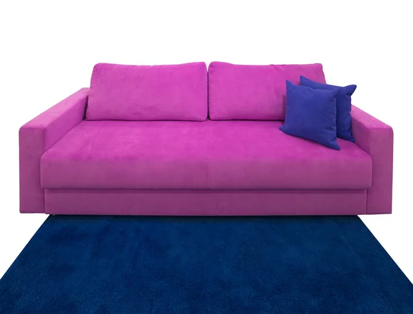 Růžový gauč s polštáři — Stock fotografie