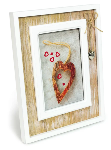 Decorative wooden photo frame with hearts. — Stock Photo, Image