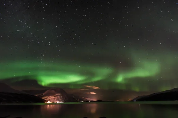 View of Aurora Borealis during a long cold night in Tromso, Norway