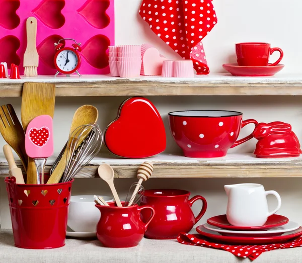 A rustic style. Ceramic tableware and kitchenware in red on the Stock Photo by ©iuliia29photo