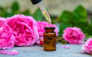 Essential oil extract of tea rose. Selective focus. nature.