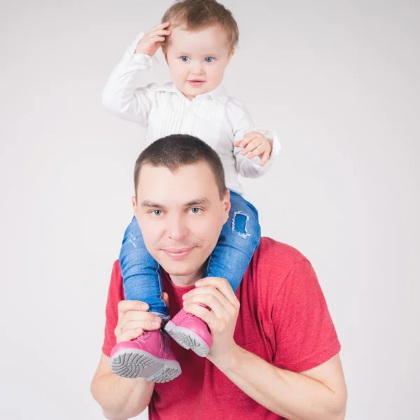 Happy father holding child at white background — Stock Photo, Image