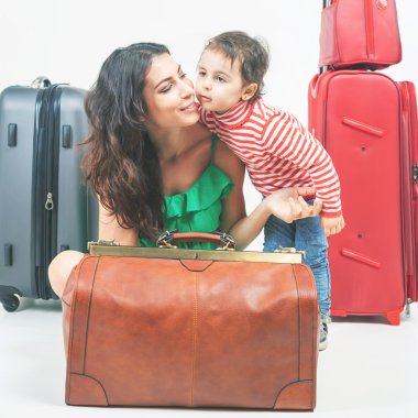 Child with mother ready to travel clipart