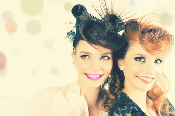 Absolutely Gorgeous Twins Girls with Fashion Make-up and Hairstyle Stock Picture