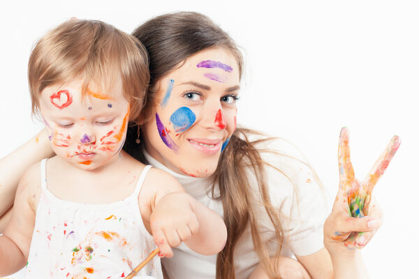 Mom and baby draws with colored inks