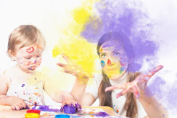 Mom and baby draws with colored inks — Stock Photo, Image