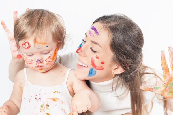 Mom and baby draws with colored inks paint — Stock Photo, Image