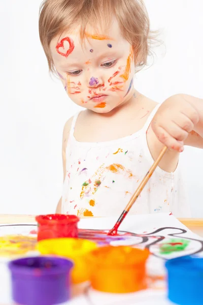 Baby draws with colored inks paint — Stock Photo, Image