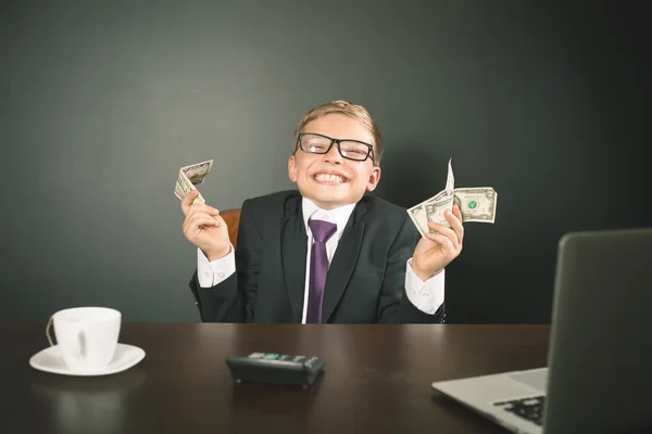 Boy has earned a lot of money — Stock Photo, Image