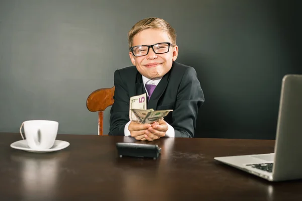 Boy has earned a lot of money — Stock Photo, Image