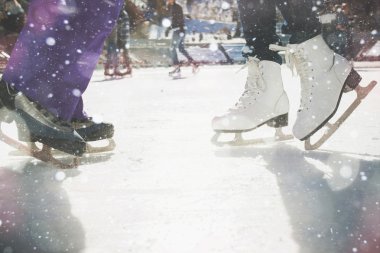 Closeup skating shoes ice skating outdoor at ice rink clipart
