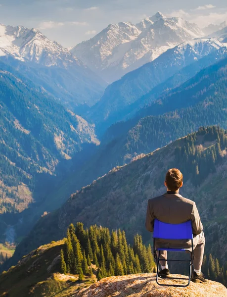 Businessman at the top of mountain — Stock Photo, Image