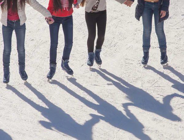 Shadow background of group of teenagers on the ice — Stock Photo, Image