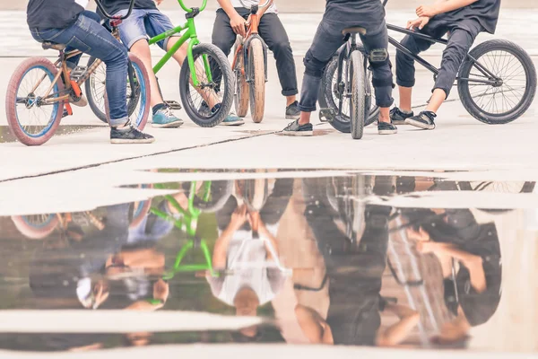 Group of teenagers on a bikes at outdoor — Stok fotoğraf