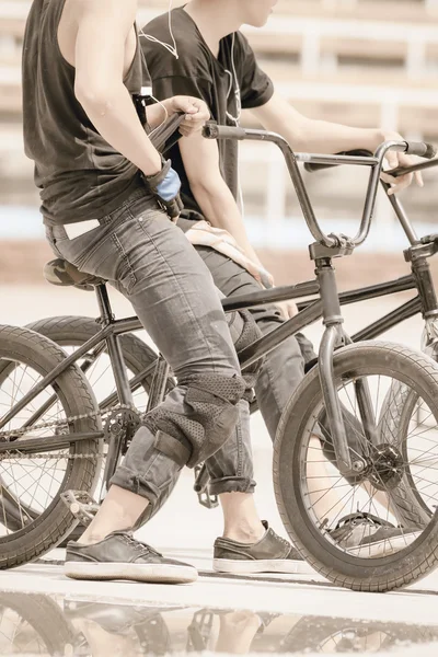 Group of teenagers on a bikes at outdoor — Stock Fotó