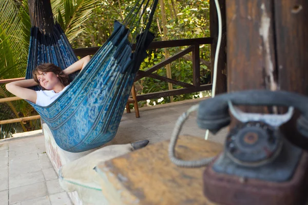 Young woman on the hammock — 图库照片