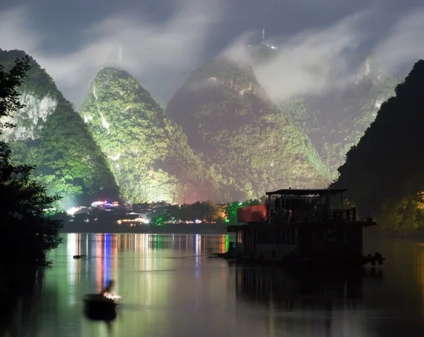 Yangshuo city near cloudy hill. Long exposure — Stock Photo, Image