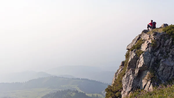 A young man at the top — Stock Photo, Image