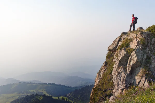 A young man at the top — Stock Photo, Image