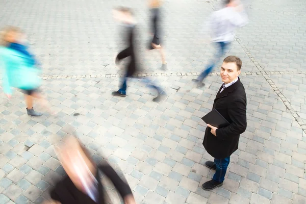 Businessman holding laptop — Stock Photo, Image