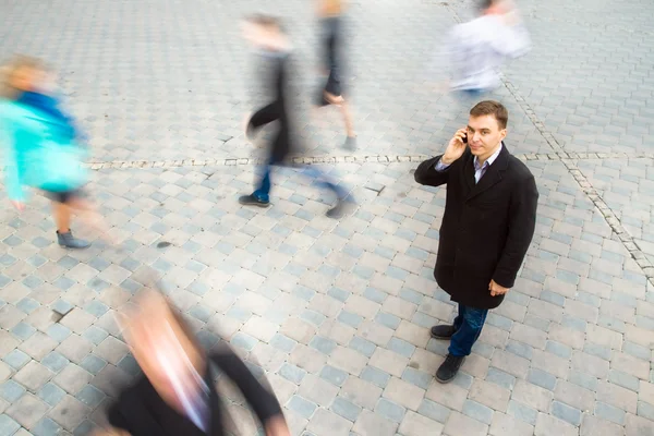 Businessman talking on mobile phone — Stock Photo, Image