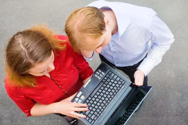 A business partners working on the street — Stock Photo, Image