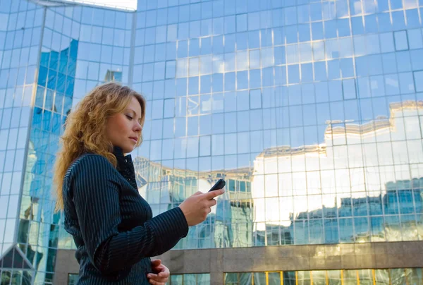 Businesswoman talking on mobile phone Stock Image