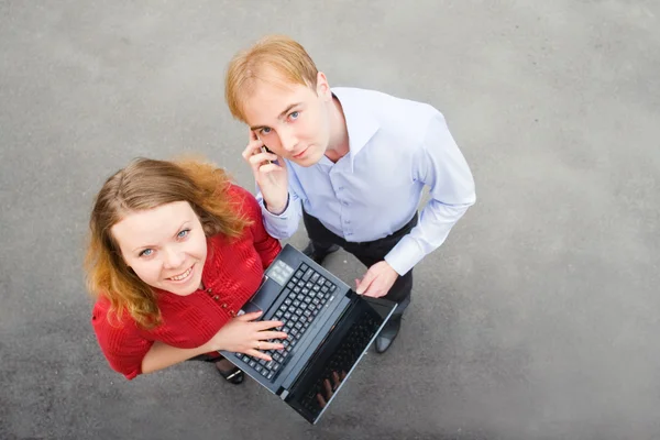 A business partners looking at the camera on the street — Stock Photo, Image