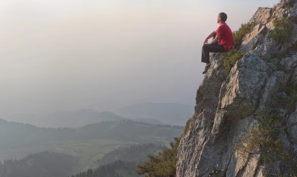 A young man at the top — Stock Photo, Image