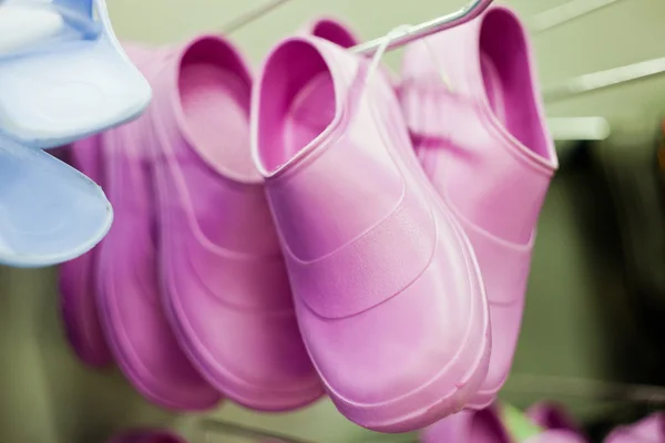 Rubber shoes in the supermarket — Stock Photo, Image