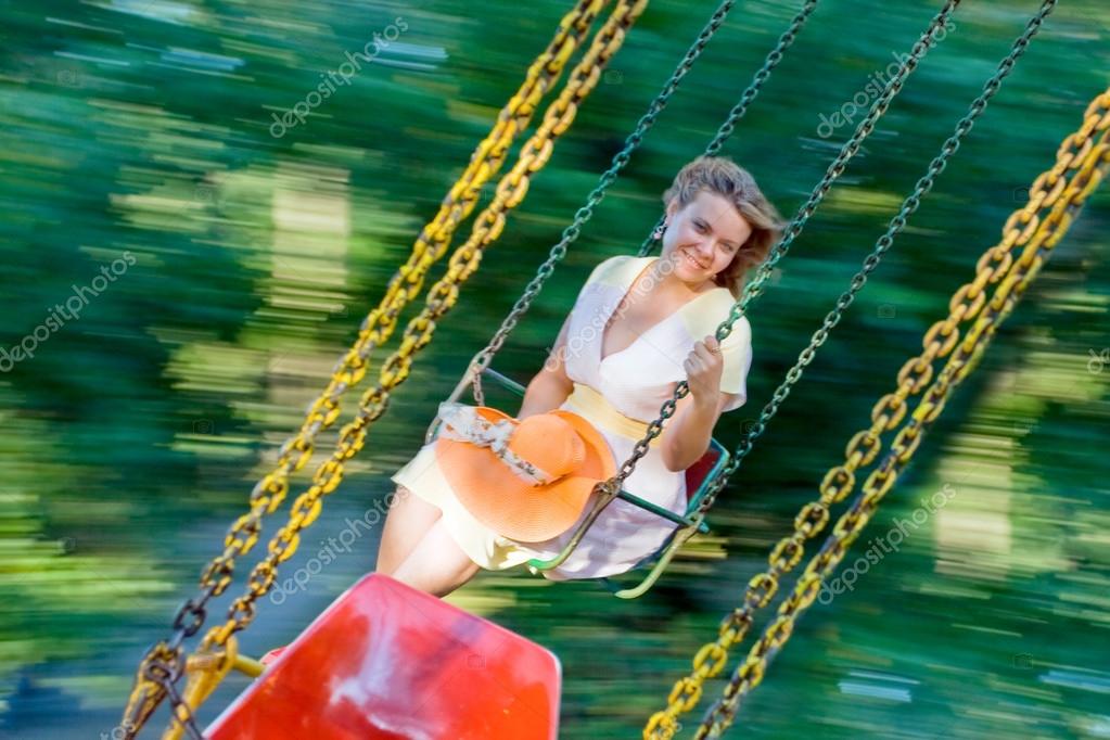 Beautiful Young Women Swinging Stock Photo C Petunyia