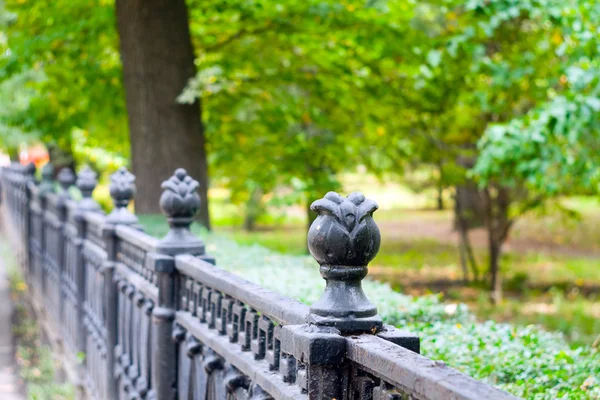 Fence in town park — Stock Photo, Image