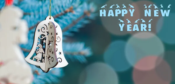 New Year decoration of angel and handmade bell — Stok fotoğraf