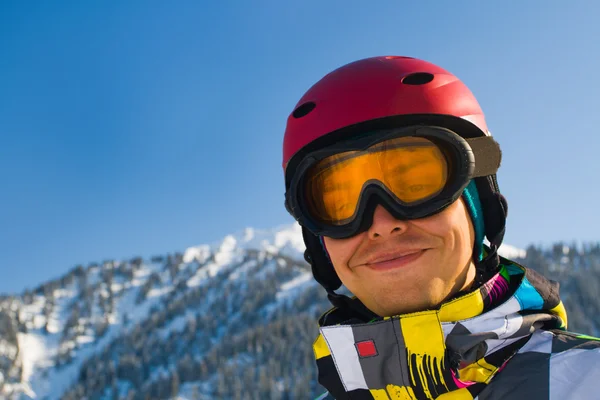 Sport man in snowy mountains — Stock Photo, Image