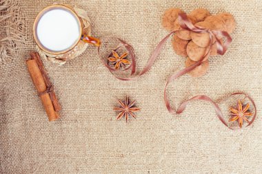 Chocolate truffles candies and vintage glass of milk or cream