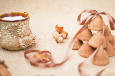 Chocolate truffles candies and vintage glass of milk or cream
