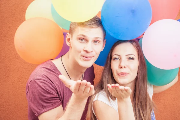 Young people sending a blow kiss to the camera — Stock Fotó