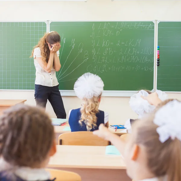 Teacher woman in stress or depression at school classroom — Stockfoto