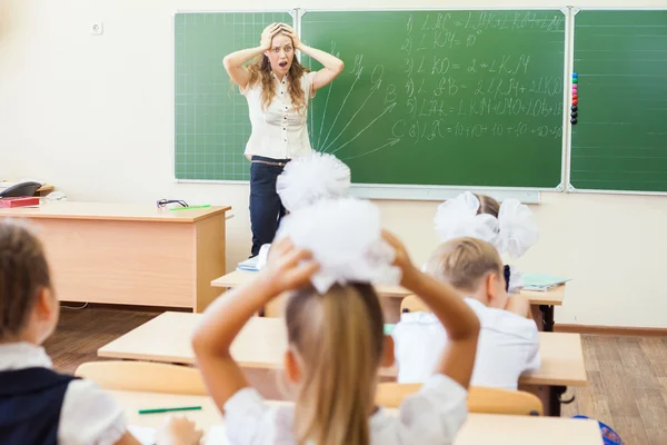 Teacher woman in stress or depression at school classroom — Stock fotografie