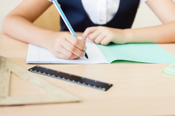 Desktop background of student sitting at desk for classwork — Stock Photo, Image