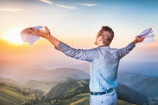 Businessman standing on top of mountain, concept of professional career — Stock Photo, Image