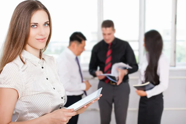 Successful business woman using tablet PC — Stock Photo, Image