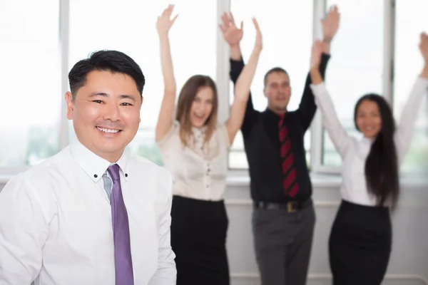 Executive asian boss with his successful business team at background — Stock Photo, Image