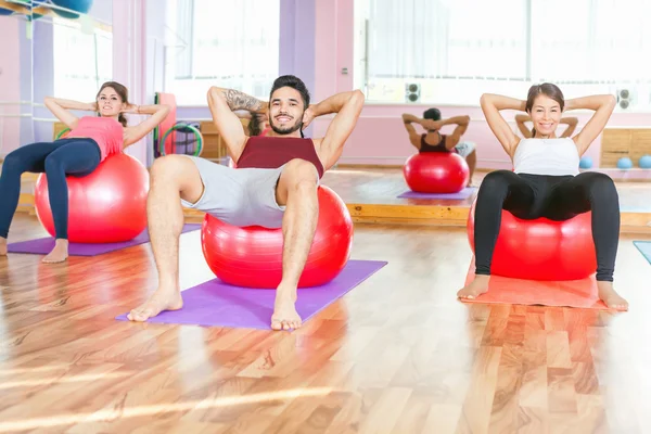 Young people lead a healthy lifestyle, exercise in fitness room