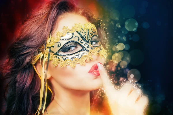 Sexy vrouw met carnaval masker Stockfoto