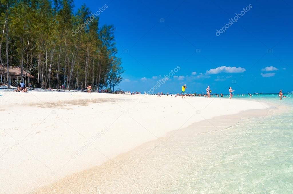 People enjoy on the beach during the trip to Phi Phi, Thailand